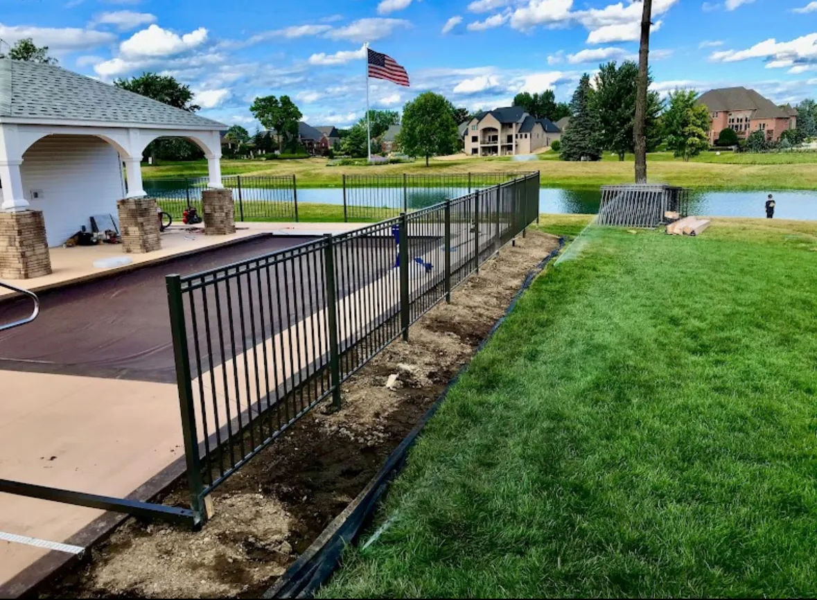 Elite Sprinkler Systems new irrigation installation at a backyard pond property in Michigan