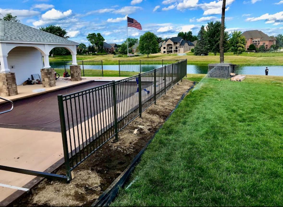 Elite Sprinkler Systems underground irrigation pipe installation at a waterfront estate in Metro Detroit, Michigan.